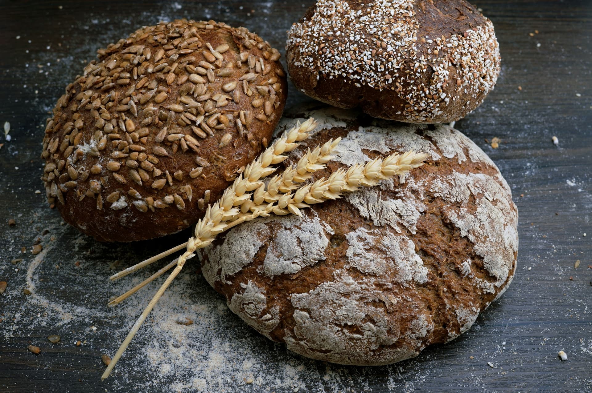 Freshly baked artisan bread on a wooden surface